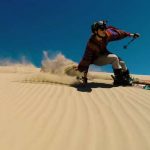 English video lesson: skiing on a sand dune. Listening comprehension, vocabulary, grammar: prepositions (in/at)