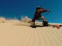 English video lesson: skiing on a sand dune. Listening comprehension, vocabulary, grammar: prepositions (in/at)